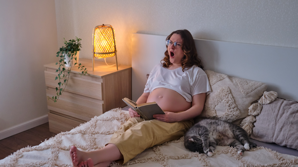 Pregnant woman practicing meditation or deep breathing