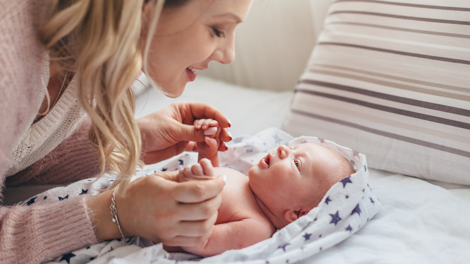 Postpartum woman practicing methods to shrink uterus