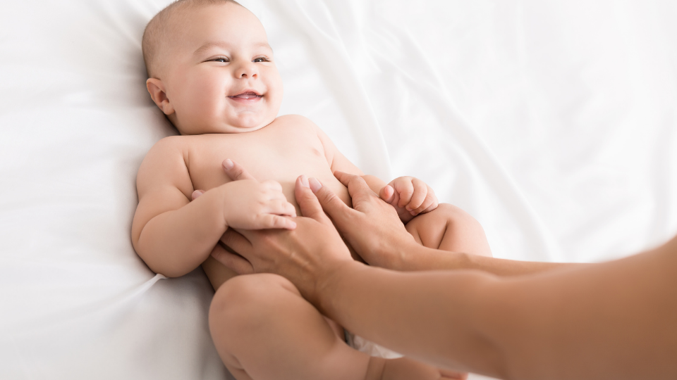 Baby showing signs of satisfaction after feeding