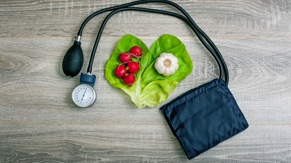 A variety of healthy foods, including leafy greens, berries, nuts, and whole grains, that help regulate blood pressure.